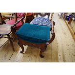 A 19th century mahogany piano stool.