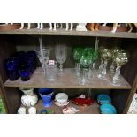 A collection of English and Continental clear and coloured glass, to include some engraved examples.