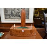 An antique mahogany plate stand, of bowfront form, 36cm wide.