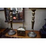 A pair of Islamic brass candlesticks, 39.5cm high; together with a similar casket.