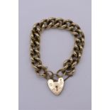 A chunky gold curb chain padlock bracelet, hallmarked 375, 83g.
