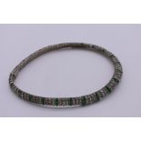 An Art Deco channel set rhinestone and chromed metal choker, by Deutsches Reichs-Gerrauchsmuster,