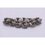 A sterling and marcasite link bracelet, 45g total weight.