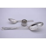 A Danish white metal serving spoon, by Peter R Hinnerup, assayed Copenhagen 1863; together with a