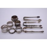 A Scottish silver napkin holder, by Francis Howard Ltd, Edinburgh 1958; together with three pairs of