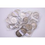 Coins: a quantity of UK silver half crowns, mostly George V, 500g.