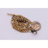 A graduated gold Albert watch chain, stamped 18ct, having attached George IV silver coin and