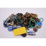 A quantity of costume jewellery, mainly beaded necklaces.
