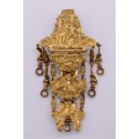 An ornate gold plated base metal chatelaine clip, 12cm long.