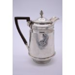 A George III silver hot water jug, by John Eames, London 1805, having acorn finial, 22cm high, 651.