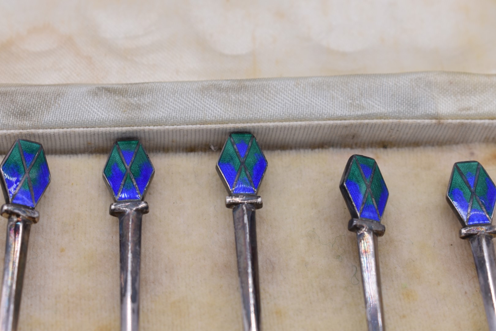 A cased set of six silver and enamel coffee spoons, by Liberty & Co, Birmingham 1934, 54g all in. - Image 2 of 3
