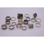 A group of silver and other fashion rings. (18)