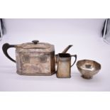 An Arts & Crafts sterling silver three piece teaset, having niello plaque decoration, 980g all in.