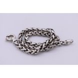 A plaited silver neck chain, stamped 925, 47g