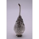 A Persian white metal rose water dropper, highly decorated birds and foliage, 19cm.