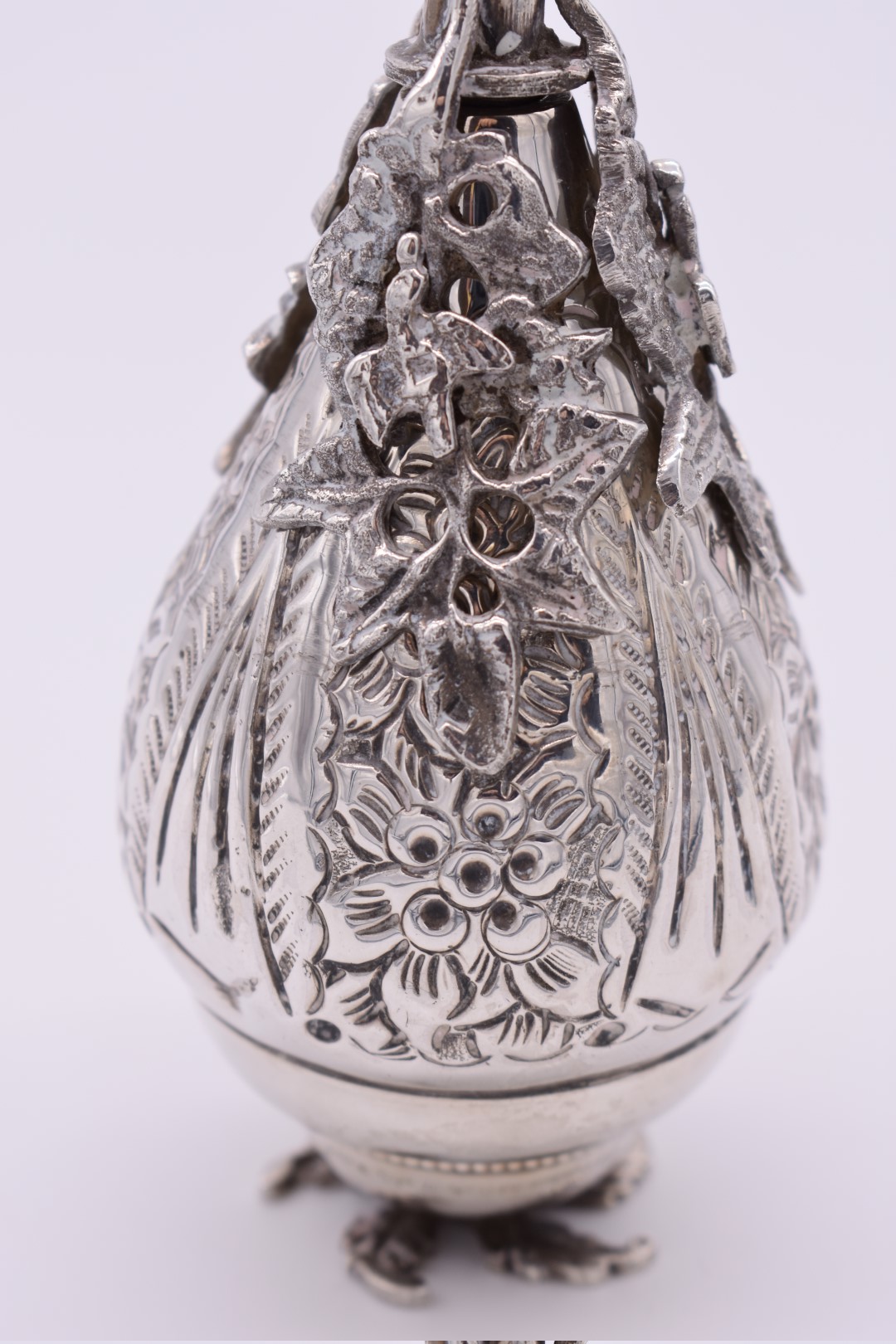 A Persian white metal rose water dropper, highly decorated birds and foliage, 19cm. - Image 2 of 3