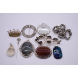 A small collection of silver and other jewellery, comprising brooches and pendants. (10)