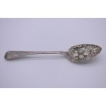 An Irish George IV silver berry spoon, Dublin 1824, the handle highly chased, 55g.