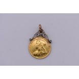 Coins: a Victoria 1895 gold sovereign, having attached pendant mount, total weight 8.9g.