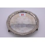 A silver card tray, by Goldsmiths & Silversmiths Ltd, Sheffield 1923, 15.5cm diameter, 226g.