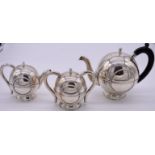 A Scandinavian Art Deco style three piece teaset, stamped .925, 977g all in.