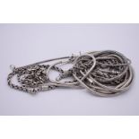 A quantity of heavy silver and other fancy chains. (11)