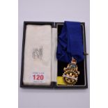 A cased gold and coloured enamel 'Rotary Club Tottenham Past President' neck badge, hallmarked
