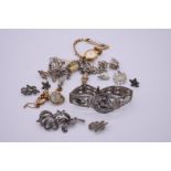 A silver charm bracelet; together with two ladies wristwatches; and other jewellery. (8)