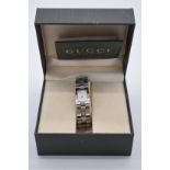 A Gucci '2305L' stainless steel quartz wristwatch, with box and guarantee booklet.