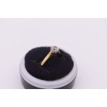 A solitaire diamond gold ring, hallmarked 750, of about .5ct, 2.5g total weight.