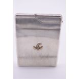 An engine turned silver combination cigarette case and lighter, by Asprey & Co, London 1932,