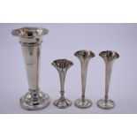A pair of Edwardian silver trumpet vases, by Walker & Hall, Sheffield 1910, 11.5cm high; together