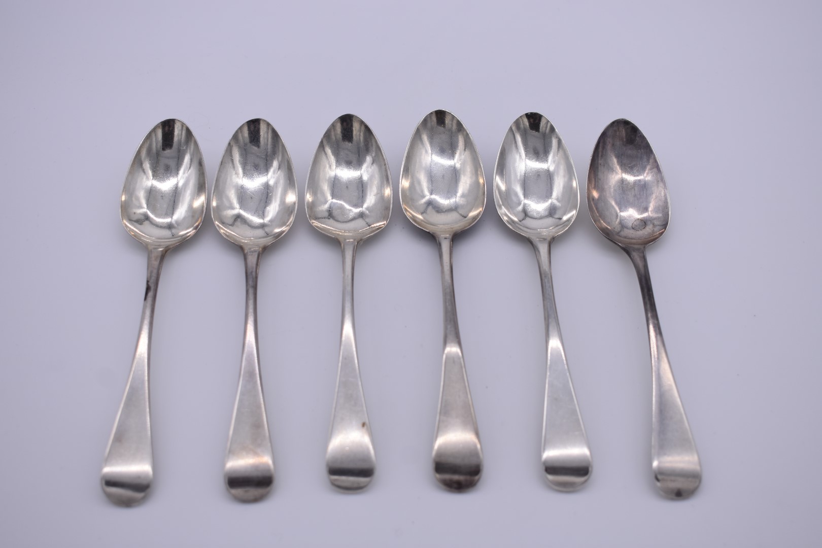 A set of six George III silver Old English pattern dessert spoons, by Solomon Hougham, London