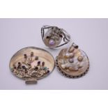 An impressive shell pendant, decorated amethyst, turquoise and rose quartz, stamped 925; together