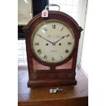 A Regency mahogany and brass inlaid twin fusee bracket clock, the 8in convex painted dial