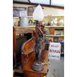 A spelter figural lamp, height including shade 92.5cm.