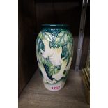 A Moorcroft 'Angel's Trumpet' pattern ovoid vase, by Anji Davenport, signed and inscribed to base,