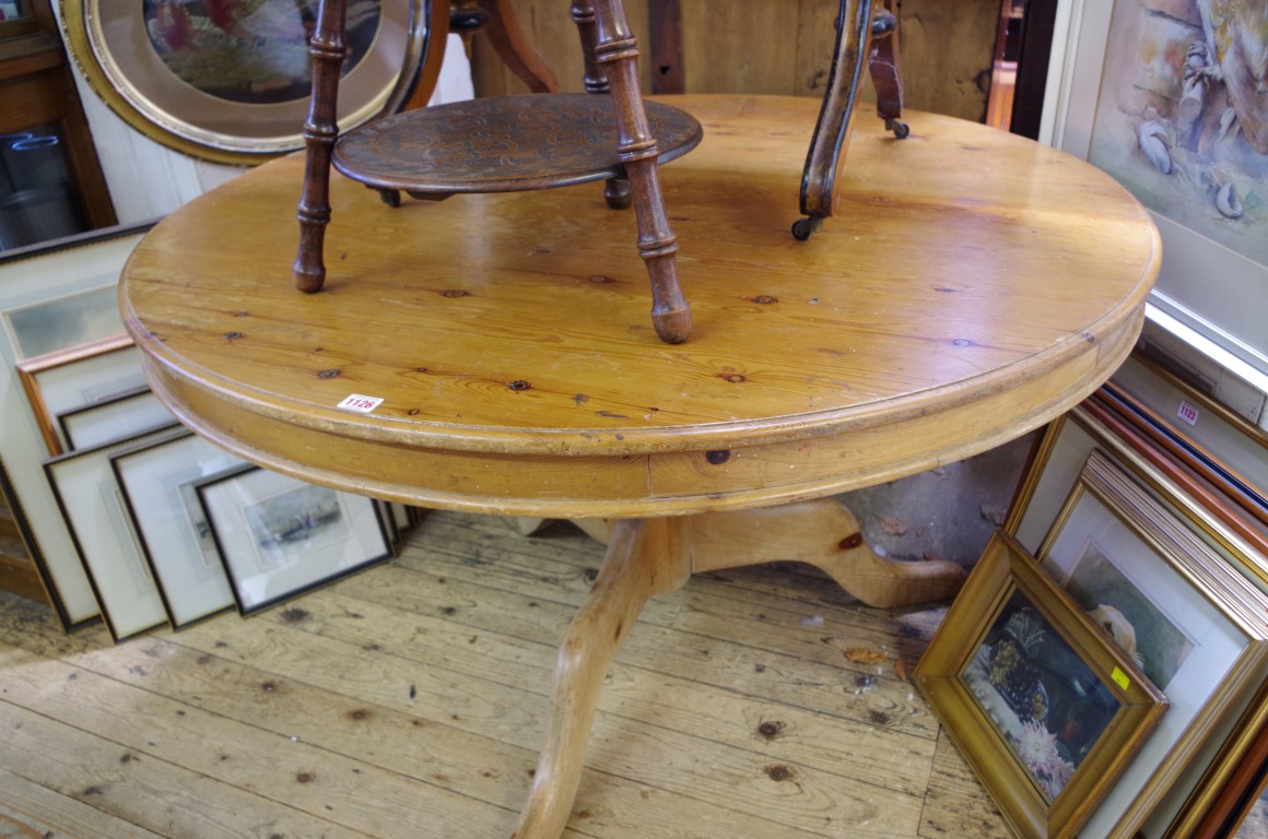 An old pine circular breakfast table, 122cm diameter.