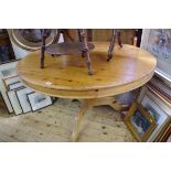 An old pine circular breakfast table, 122cm diameter.