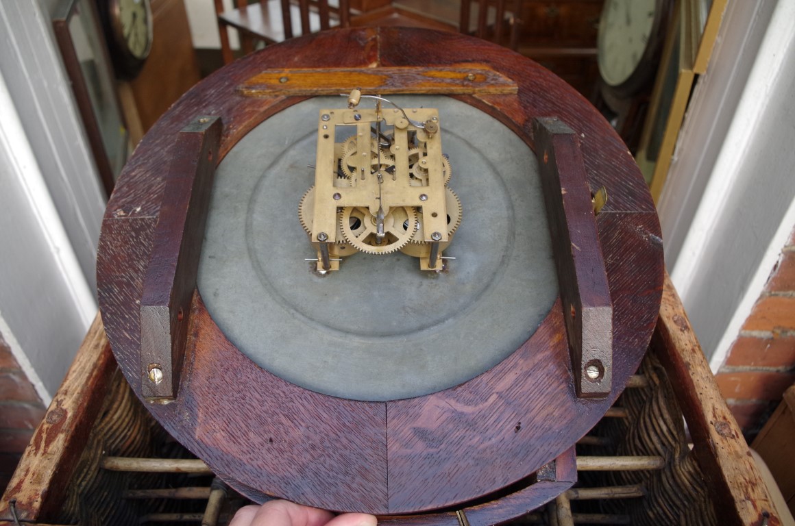 An oak circular wall clock, with 12in painted dial, with pendulum and winding key. - Image 2 of 6