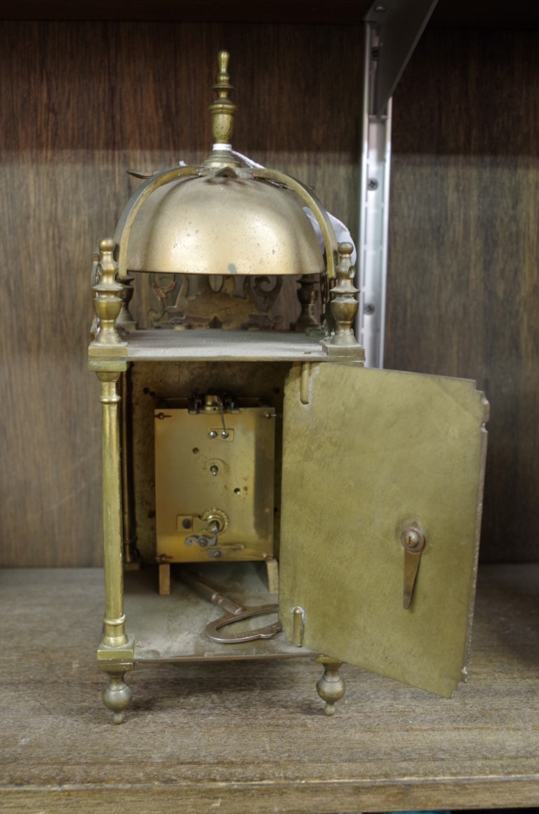 An old reproduction brass lantern style clock, 30cm high. - Image 2 of 3