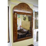 An 18th century walnut and marquetry framed wall mirror, 108 x 64cm.