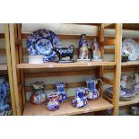 A collection of Victorian and later pottery, to include Mason's jugs. (two shelves)