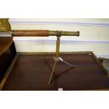 An antique leather and brass two drawer telescope, by 'Watkins & Hill, Charing Cross', 60.5cm