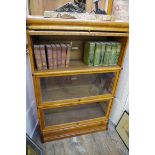 An early 20th century Globe-Wernicke oak three tier sectional bookcase, 86.5cm wide.