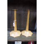 A pair of Edward Barnsley Workshop oak and brass pricket candlesticks, on scalloped octagonal bases,