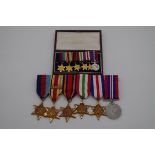 A group of medals, with corresponding miniatures.