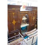 A circa 1900 mahogany and inlaid triple wardrobe, 194.5cm wide.