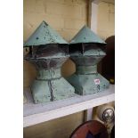 A pair of verdigris copper barn chimney vents, 33cm high.