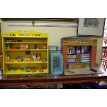 A vintage 'Kiddicraft Miniatures' shop display, 42cm wide; together with a similar 'Playtime Drapery